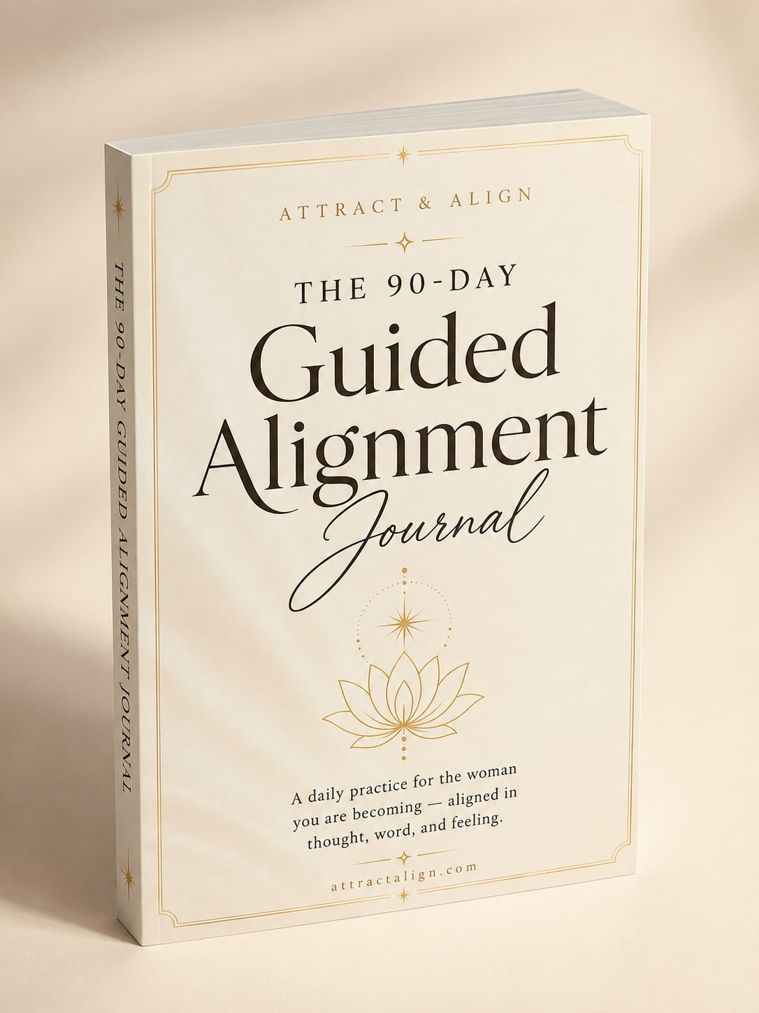 The 90-Day Guided Alignment Journal, a paperback standing with its spine visible